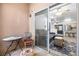 View from patio into living room, showing furniture and bright light at 5751 Hacienda Ave # 135, Las Vegas, NV 89122