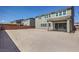 Spacious backyard with a patio, surrounded by a brick wall at 5913 Flowering Hill Ct, Las Vegas, NV 89131