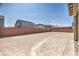 Spacious backyard surrounded by a brick wall at 5913 Flowering Hill Ct, Las Vegas, NV 89131
