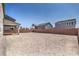 Spacious backyard with privacy wall, ideal for creating an outdoor oasis and entertaining space at 5913 Flowering Hill Ct, Las Vegas, NV 89131