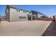 Spacious backyard with a patio, surrounded by a brick wall at 5913 Flowering Hill Ct, Las Vegas, NV 89131