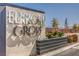 Elegant Elkhorn Grove community sign with manicured landscaping, showcasing the neighborhood's appeal at 5913 Flowering Hill Ct, Las Vegas, NV 89131
