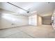 Spacious two-car garage with a concrete floor at 5913 Flowering Hill Ct, Las Vegas, NV 89131