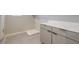 Modern laundry room with a countertop and grey floors at 5913 Flowering Hill Ct, Las Vegas, NV 89131