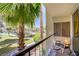 Relaxing balcony view with outdoor seating and lush landscaping at 725 N Royal Crest Cir # 214, Las Vegas, NV 89169