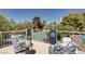 Cozy balcony with comfortable seating and charming decor, offering a relaxing outdoor space at 725 N Royal Crest Cir # 214, Las Vegas, NV 89169