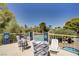 Serene balcony overlooking lush greenery, featuring comfortable seating for enjoying the outdoors at 725 N Royal Crest Cir # 214, Las Vegas, NV 89169