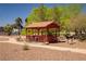 Charming gazebo surrounded by greenery, providing a peaceful retreat for outdoor enjoyment at 725 N Royal Crest Cir # 214, Las Vegas, NV 89169