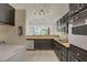 Fully equipped kitchen with wooden counter tops, dark cabinets, and modern appliances at 725 N Royal Crest Cir # 214, Las Vegas, NV 89169