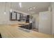 Kitchen featuring modern appliances, eat in space, and dark, stylish cabinets at 725 N Royal Crest Cir # 214, Las Vegas, NV 89169