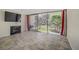 Bright living room features large windows and a fireplace, creating a cozy atmosphere at 725 N Royal Crest Cir # 214, Las Vegas, NV 89169