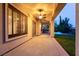 Covered patio with a view of the backyard and fenced pool area at 7416 Redhead Dr, North Las Vegas, NV 89084