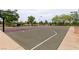 Outdoor basketball court features painted lines, basketball hoops, and landscaped surroundings at 7416 Redhead Dr, North Las Vegas, NV 89084
