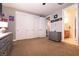 Bedroom with sliding closet door and ensuite bathroom access at 7416 Redhead Dr, North Las Vegas, NV 89084
