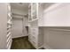 A spacious walk-in closet with custom shelving and ample storage at 7416 Redhead Dr, North Las Vegas, NV 89084