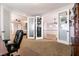 Open loft area with french doors with access to additional bedrooms and living space at 7416 Redhead Dr, North Las Vegas, NV 89084