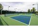Community pickleball courts featuring multiple courts and lights for evening games at 7416 Redhead Dr, North Las Vegas, NV 89084