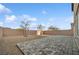 The backyard features low-maintenance landscaping with a paved patio and gravel groundcover at 9068 Lennon Ln, Las Vegas, NV 89113