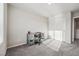 Bedroom featuring a closet with sliding doors and a gray carpeted floor at 9068 Lennon Ln, Las Vegas, NV 89113