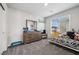 bedroom with a wooden dresser, and a comfortable bed at 9068 Lennon Ln, Las Vegas, NV 89113