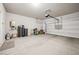 Spacious garage with ample storage space and functional features like water heater at 9068 Lennon Ln, Las Vegas, NV 89113