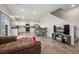 Open concept kitchen featuring stainless steel appliances, bar stool seating, and recessed lighting at 9068 Lennon Ln, Las Vegas, NV 89113