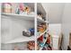 Pantry with organized shelving provides ample storage space for food and household items at 9068 Lennon Ln, Las Vegas, NV 89113