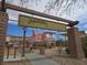 Community playground featuring a whimsical wooden structure with slides and climbing areas at 9068 Lennon Ln, Las Vegas, NV 89113