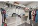 Organized walk-in closet with ample shelving and hanging space at 9068 Lennon Ln, Las Vegas, NV 89113