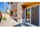 Exterior backyard patio with sliding glass door, landscaping and privacy at 9115 Canoga Canyon Ct # 102, Las Vegas, NV 89149