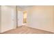 Neutral bedroom with closet, carpet, and view of upstairs hallway at 9115 Canoga Canyon Ct # 102, Las Vegas, NV 89149
