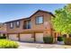 Charming townhouse featuring a private balcony and three garage spaces at 9115 Canoga Canyon Ct # 102, Las Vegas, NV 89149