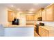 Bright kitchen with ample cabinetry, countertops, and modern appliances at 9115 Canoga Canyon Ct # 102, Las Vegas, NV 89149