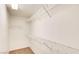 White walk-in closet space with shelves at 9115 Canoga Canyon Ct # 102, Las Vegas, NV 89149