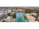 Breathtaking aerial view of canal-front properties, complete with boat docks and verdant landscaping, creating an oasis at 10021 Skipper Ct, Las Vegas, NV 89117