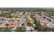 Panoramic aerial shot showcases a vast neighborhood featuring a mix of houses, lush trees and manicured streets at 10021 Skipper Ct, Las Vegas, NV 89117