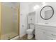 Bathroom with glass-enclosed shower and white vanity at 10021 Skipper Ct, Las Vegas, NV 89117