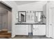 Bathroom with dual sinks, framed mirrors, and white cabinets offering plenty of storage at 10021 Skipper Ct, Las Vegas, NV 89117