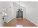 Well-lit dining area with hardwood floors and a modern chandelier at 10021 Skipper Ct, Las Vegas, NV 89117