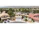 Charming two-story home featuring a two-car garage, desert landscaping, and solar panels on a quiet street at 10021 Skipper Ct, Las Vegas, NV 89117