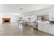 Spacious kitchen with stainless steel appliances, granite countertops, tiled floors, and a cozy breakfast nook at 10021 Skipper Ct, Las Vegas, NV 89117