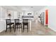 Open kitchen with granite countertops and stainless-steel appliances at 10021 Skipper Ct, Las Vegas, NV 89117