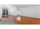 Spacious living room with vaulted ceiling, hardwood floors, and natural light at 10021 Skipper Ct, Las Vegas, NV 89117