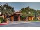 Elegant home with a red tile roof, stone accents, and beautifully landscaped surroundings at 15 Rue Du Rivoli Pl, Henderson, NV 89011