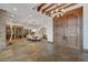 Grand foyer showcasing a massive wood door, stone accents, and an open view of the elegant dining area at 15 Rue Du Rivoli Pl, Henderson, NV 89011