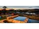 Inviting hot tub with views of the city and the golf course and lounge chairs at 15 Rue Du Rivoli Pl, Henderson, NV 89011