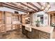 Well-appointed kitchen featuring custom cabinetry, farmhouse sink, large center island, and premium finishes at 15 Rue Du Rivoli Pl, Henderson, NV 89011