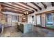 Designer kitchen with a large island, stone floors, custom cabinets, and high-end appliances at 15 Rue Du Rivoli Pl, Henderson, NV 89011