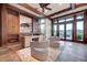 Home office featuring built-in bookshelves, natural light, and spacious layout at 15 Rue Du Rivoli Pl, Henderson, NV 89011