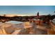 Elegant outdoor dining area with a barbecue grill and scenic views, perfect for entertaining at 15 Rue Du Rivoli Pl, Henderson, NV 89011